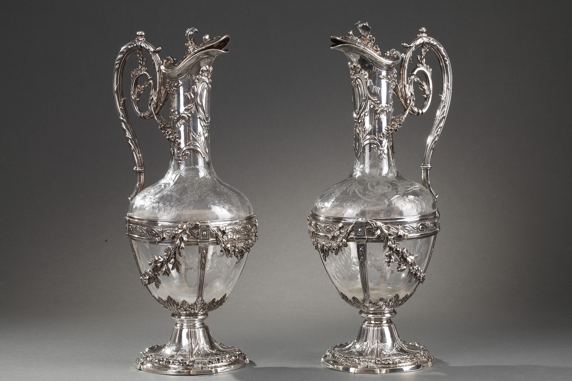 A PAIR OF CUT-GLASS SILVER-MOUNTED DECANTERS, Edmond Tétard